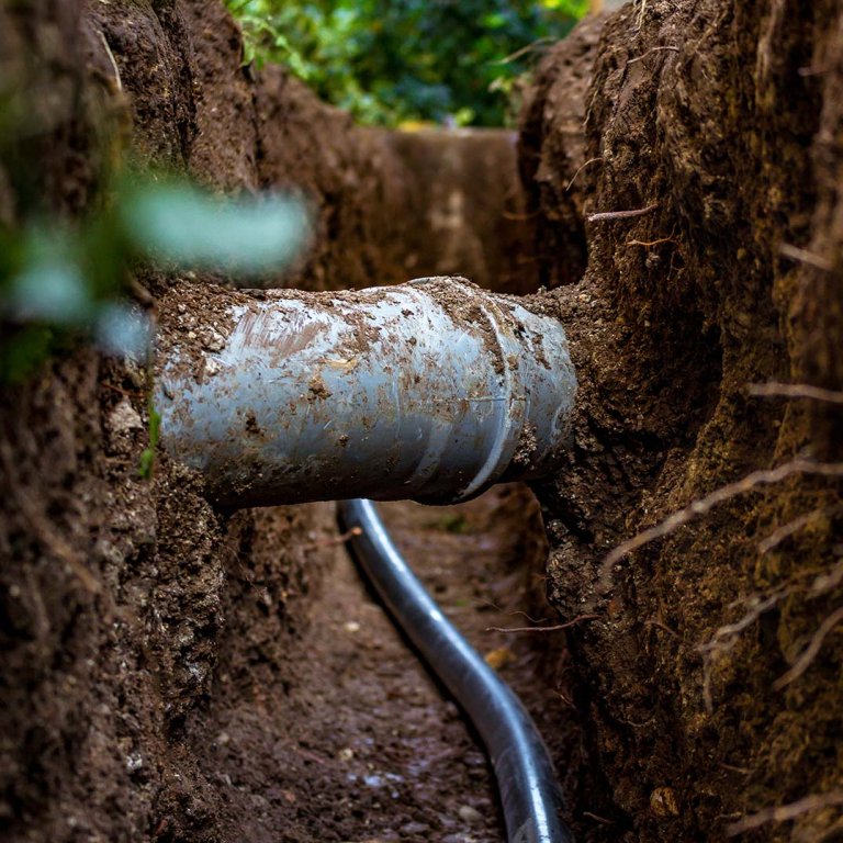 Pipes in trench and earth